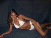 Marcie Brown - Off White swimsuit laying on side