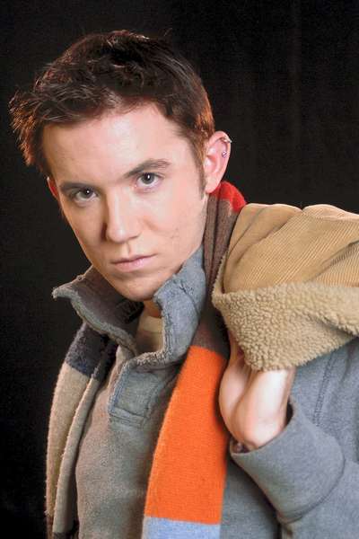 Zach - Coat over the shoulder