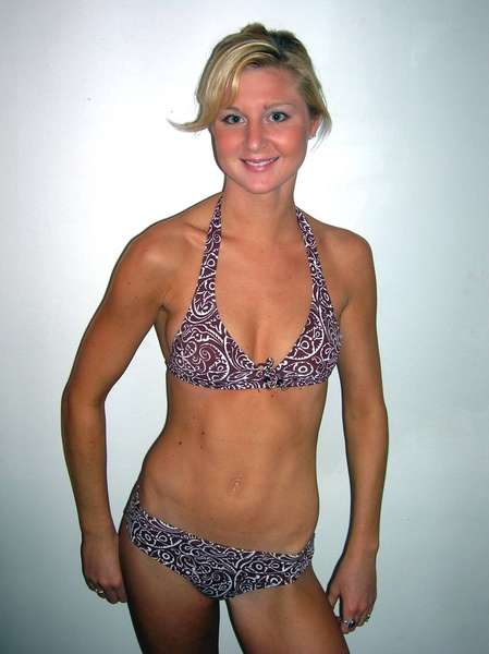 Carolyn Yates - brown suit pose