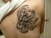 crystal lynn - peacock on my right shoulder blade (before the color)
